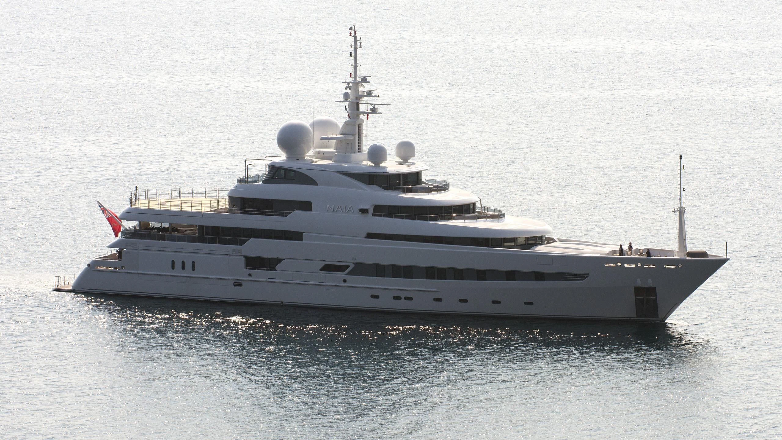 a large ship in the water aboard NAIA Yacht for Sale
