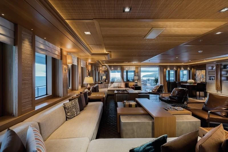 a living room with a large window aboard NAIA Yacht for Sale