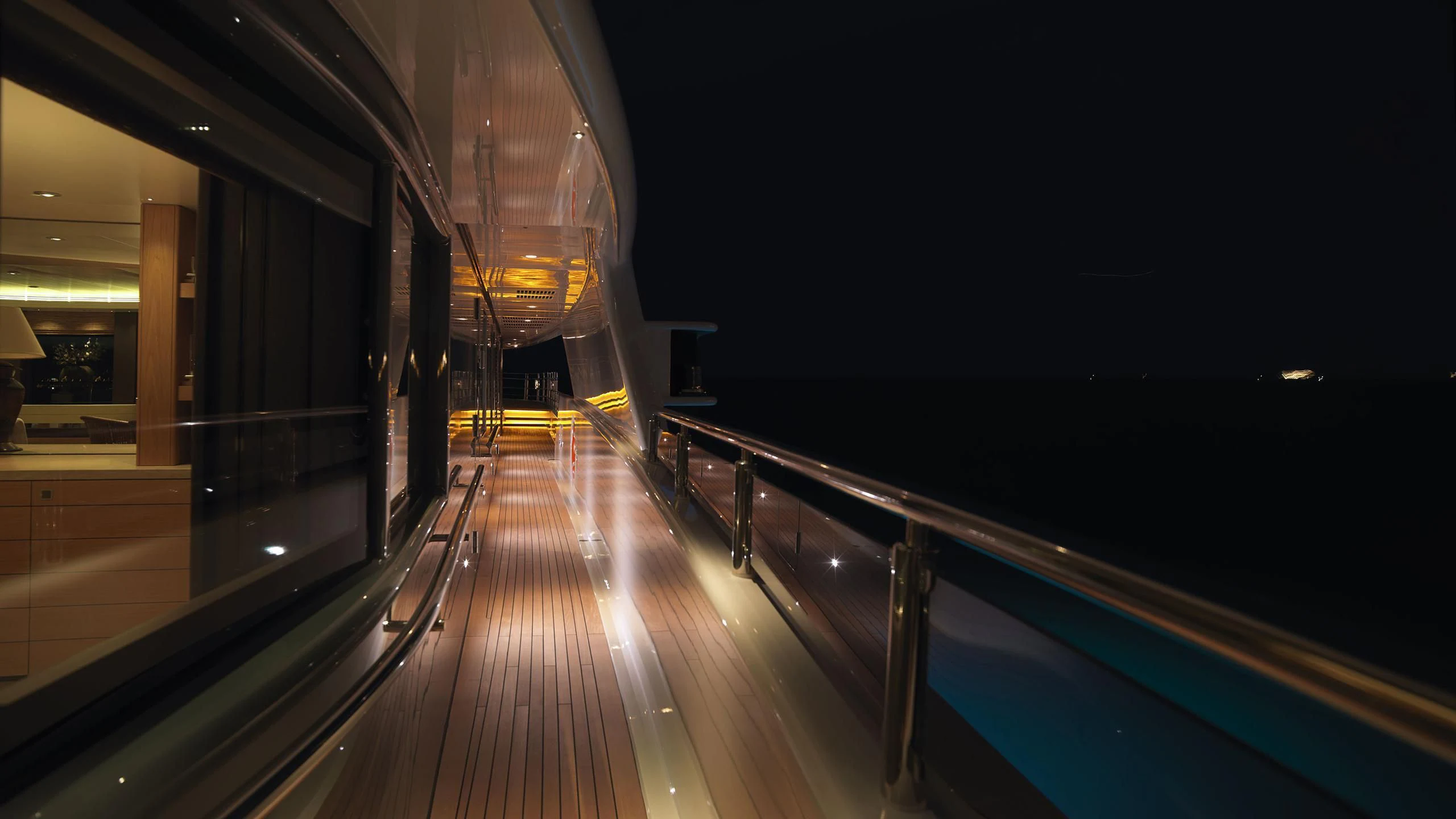 a long wooden walkway aboard NAIA Yacht for Sale