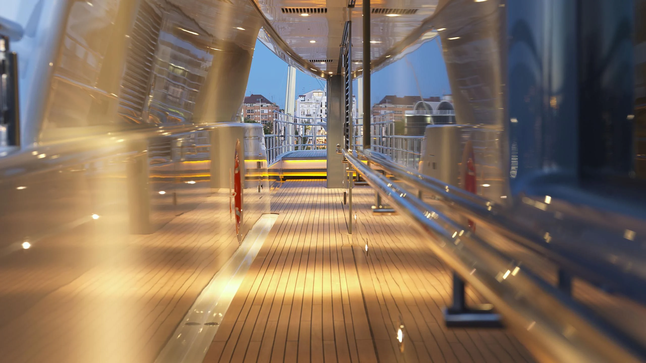 a long wooden bridge aboard NAIA Yacht for Sale