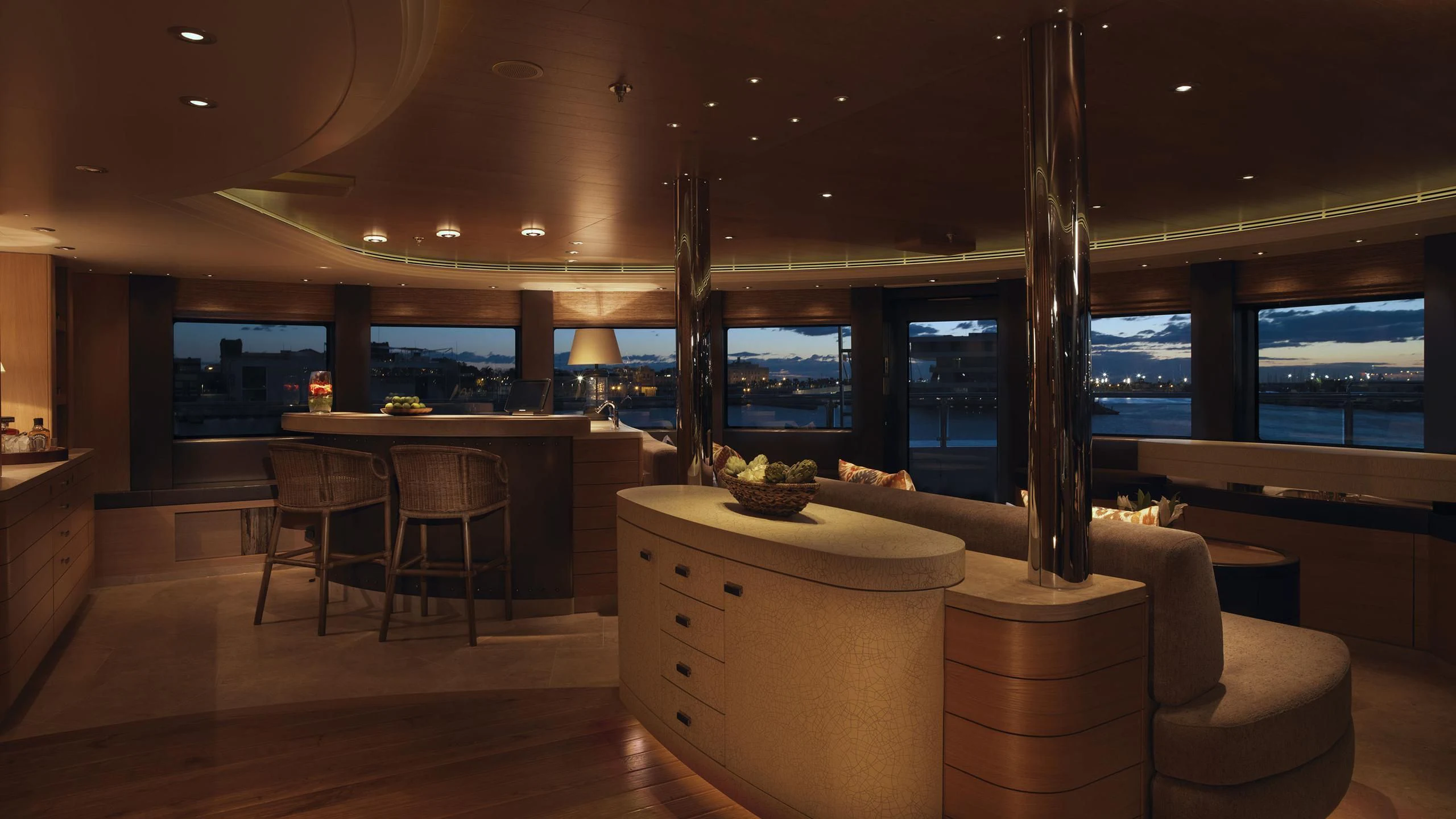 a room with a table and chairs aboard NAIA Yacht for Sale