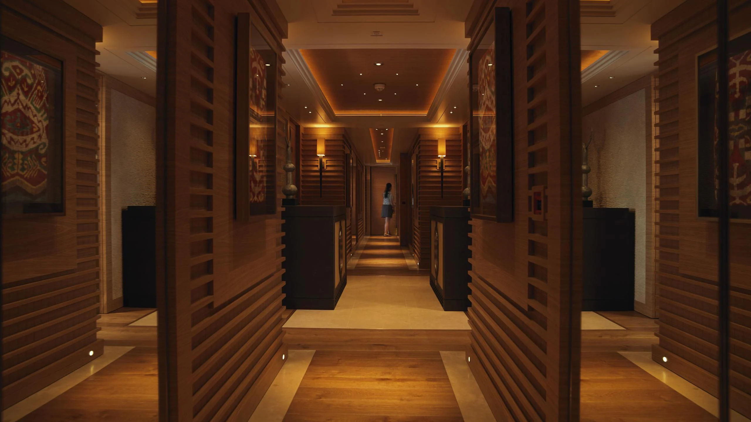 a hallway with wood floors aboard NAIA Yacht for Sale