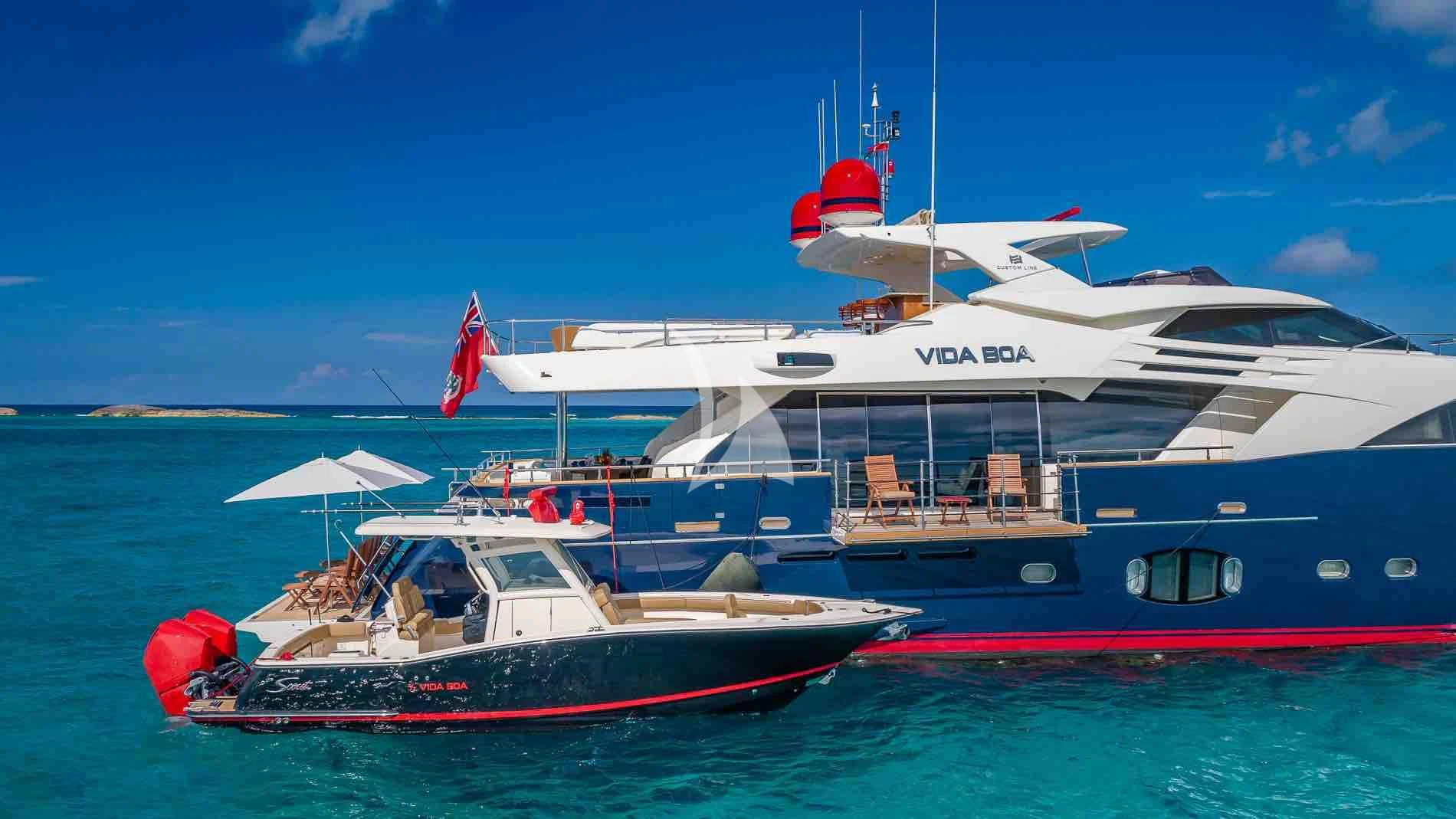 a couple of boats in the water aboard ONE AND ONLY Yacht for Sale