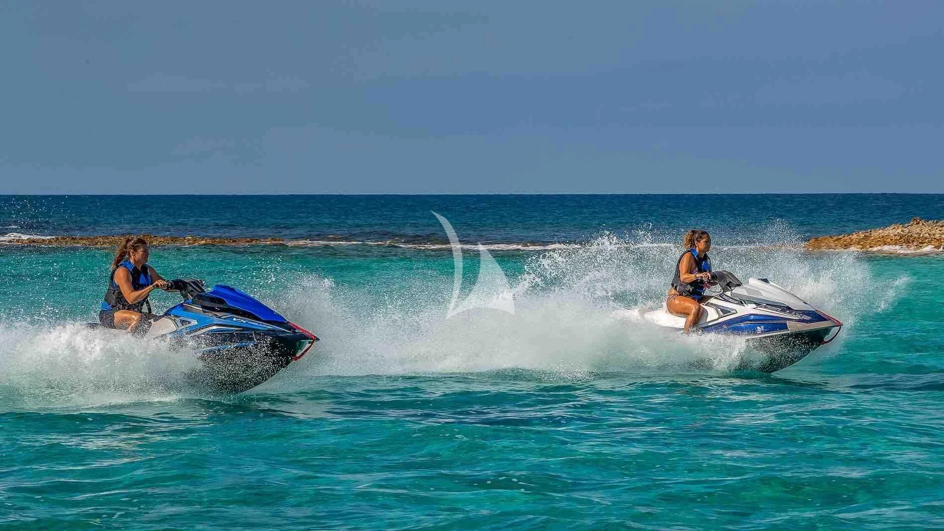 people on a jet ski aboard ONE AND ONLY Yacht for Sale