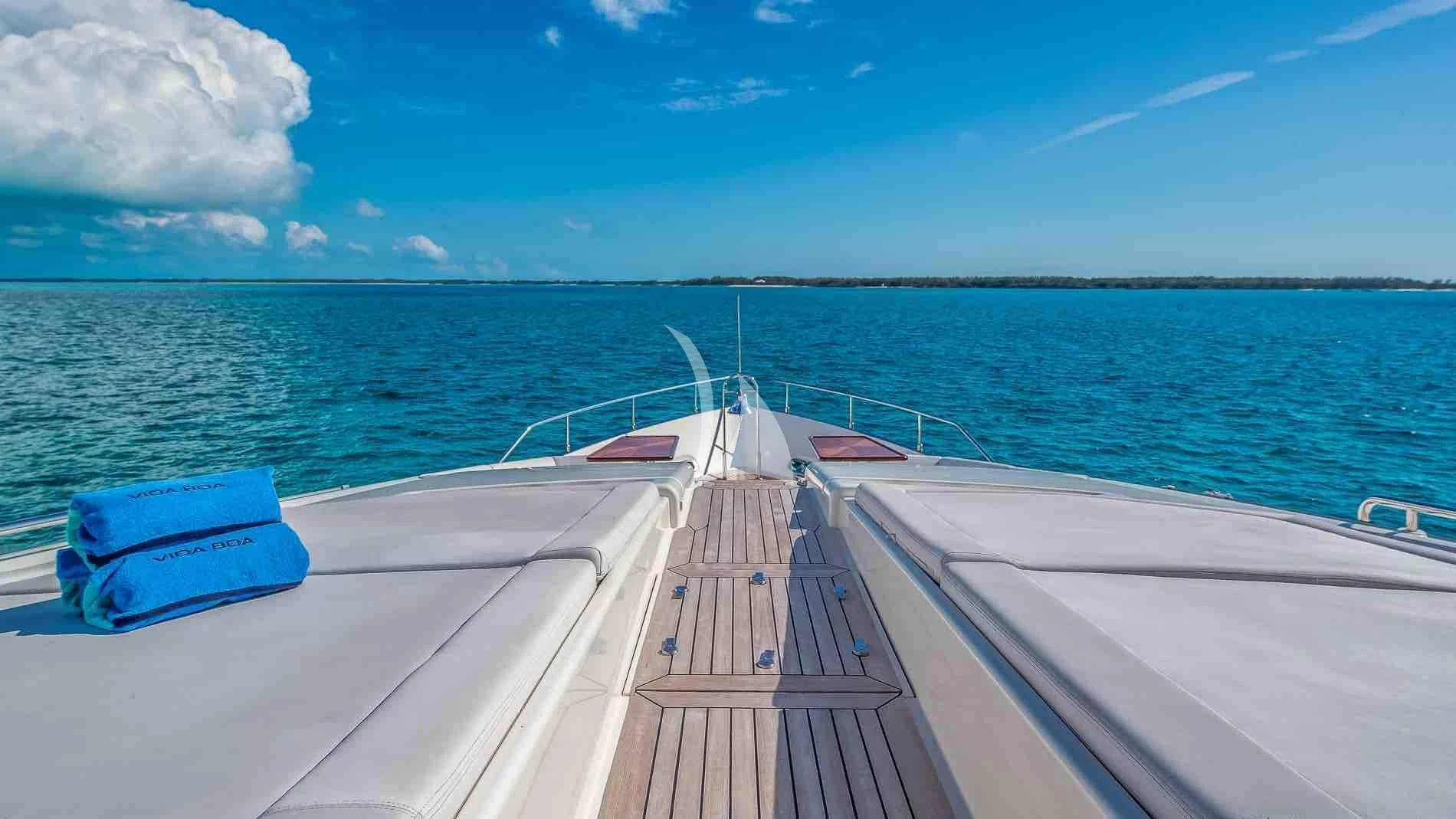 a wooden dock over a body of water aboard ONE AND ONLY Yacht for Sale
