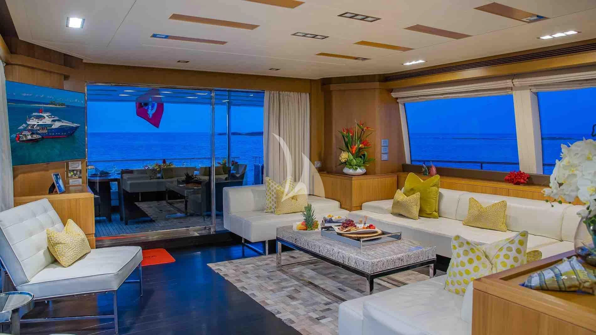 a living room with a large window aboard ONE AND ONLY Yacht for Sale