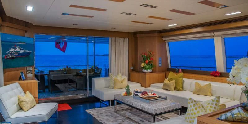 a living room with a large window aboard ONE AND ONLY Yacht for Sale