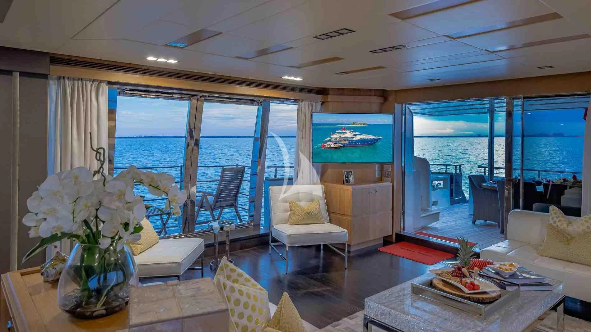 a living room with a large window aboard ONE AND ONLY Yacht for Sale