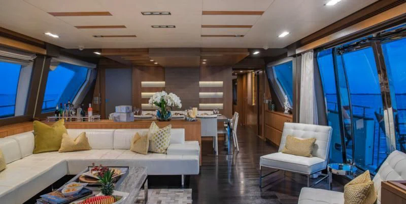 a living room with a large window aboard ONE AND ONLY Yacht for Sale