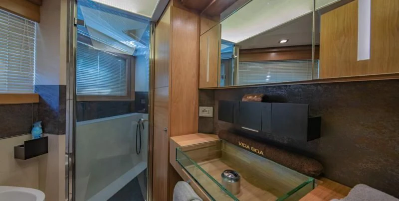 a kitchen with a countertop sink and cabinets aboard ONE AND ONLY Yacht for Sale