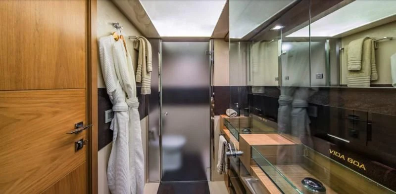 a bathroom with a large mirror aboard ONE AND ONLY Yacht for Sale