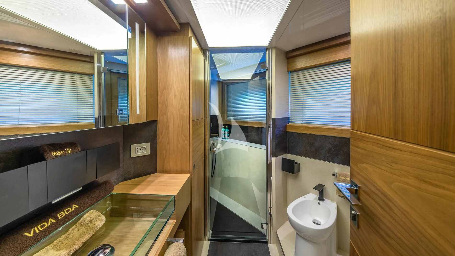 a bathroom with a sink and a shower aboard ONE AND ONLY Yacht for Sale