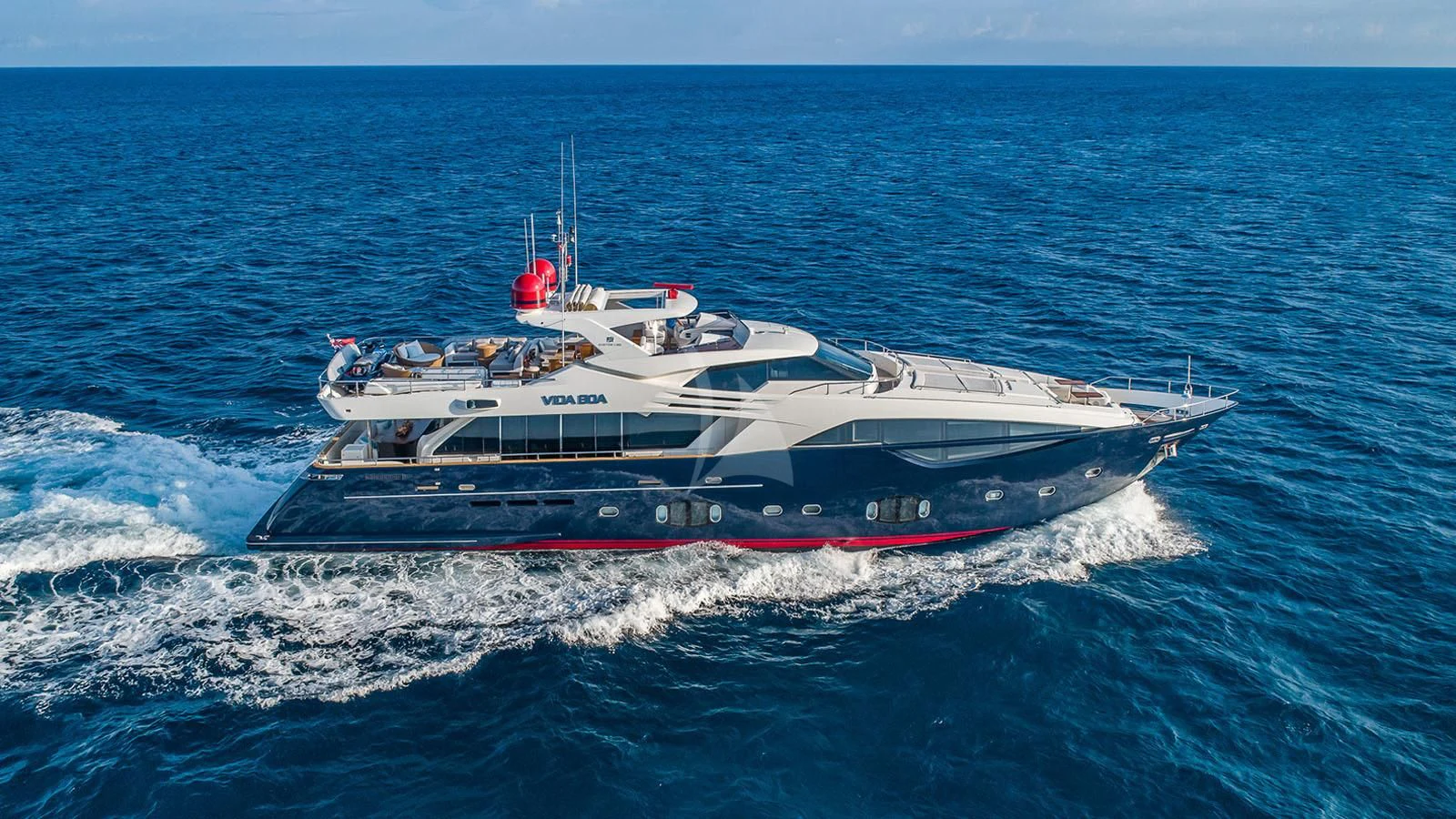 a large boat on the water aboard ONE AND ONLY Yacht for Sale