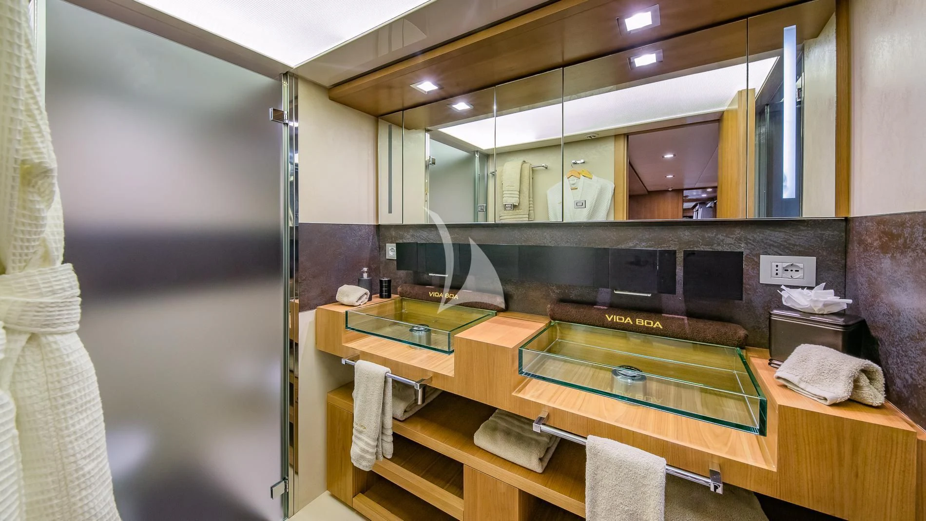 a bathroom with a mirror aboard ONE AND ONLY Yacht for Sale