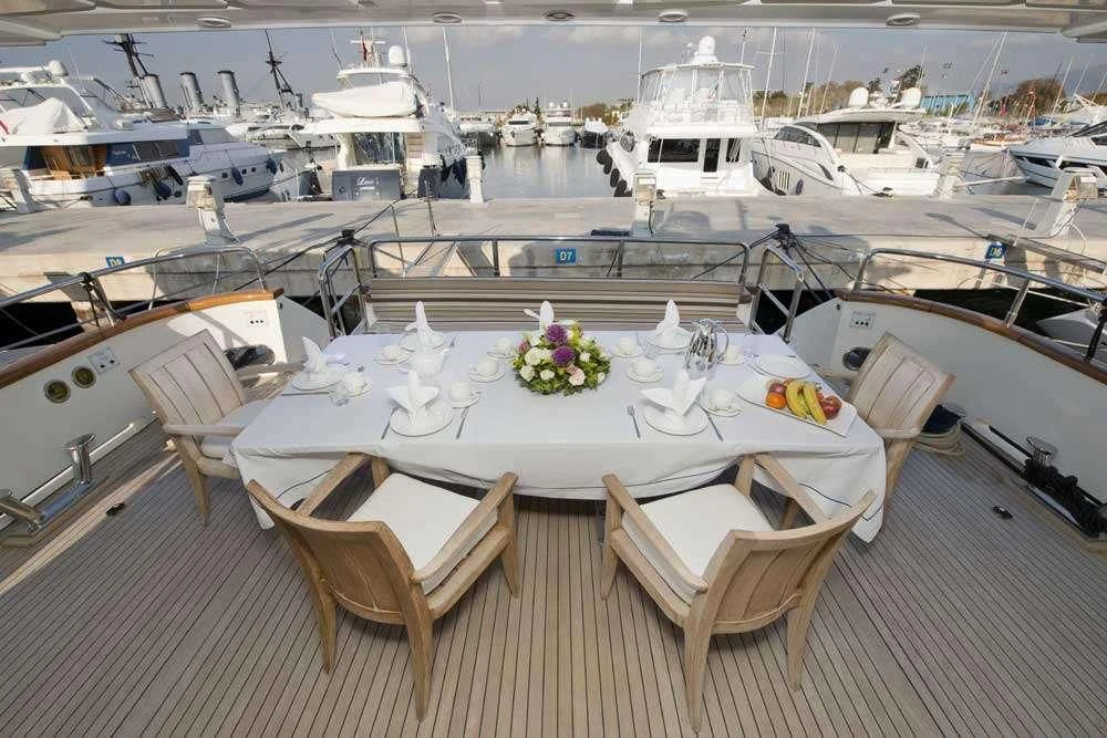 a table set for a wedding aboard FALCON ISLAND Yacht for Sale