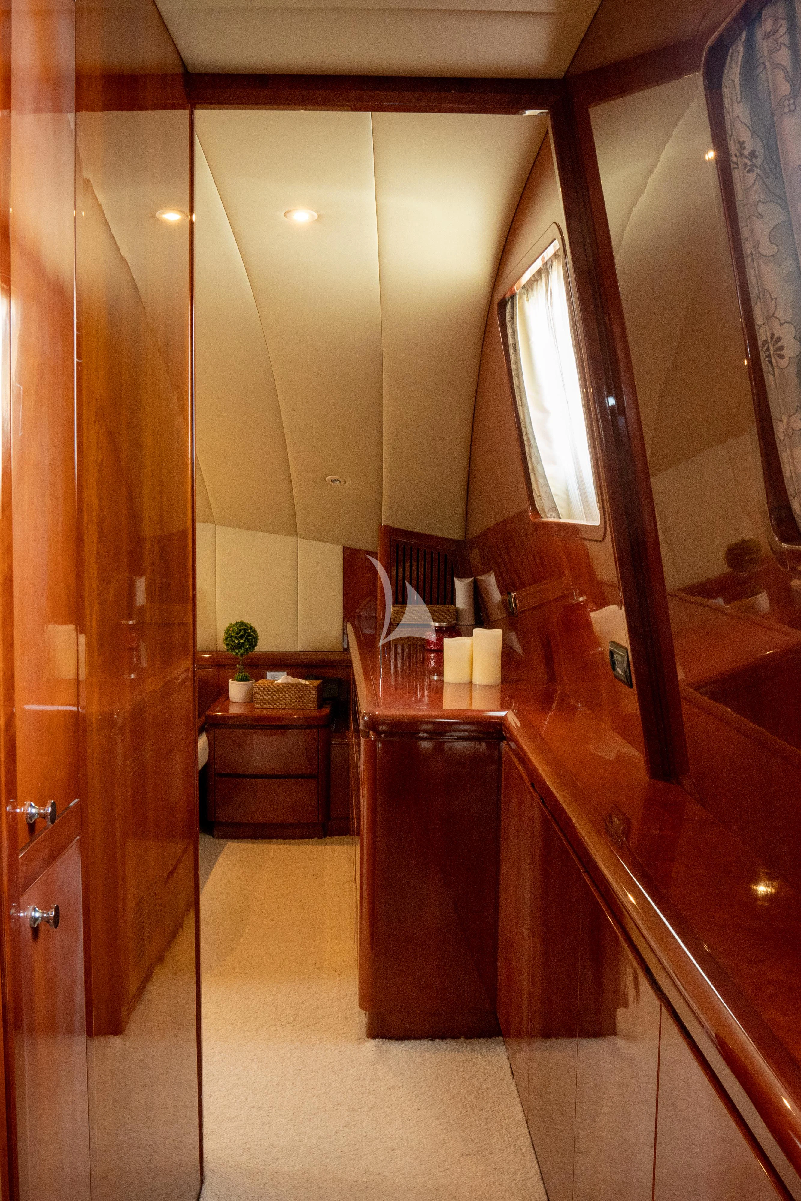 a bathroom with a countertop sink and cabinets aboard FALCON ISLAND Yacht for Sale