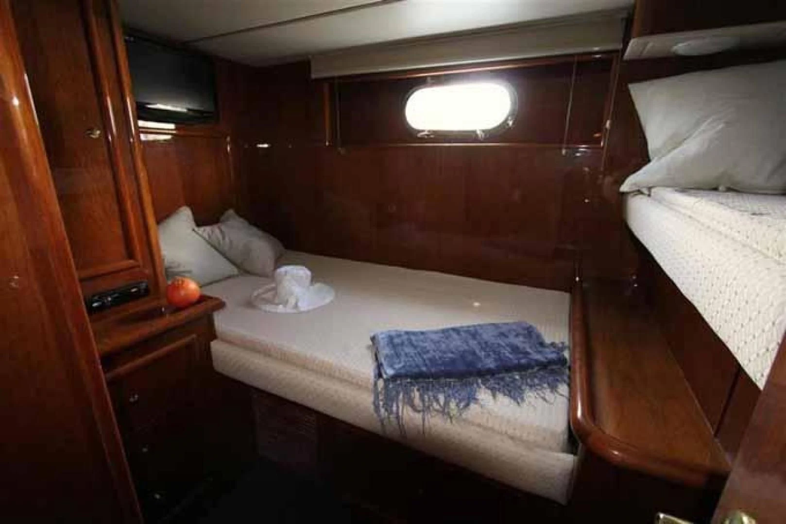 a bed with two beds aboard DOLCE VITA Yacht for Sale