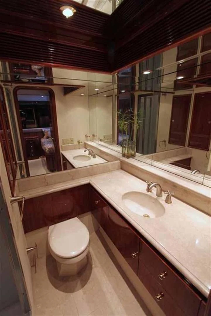 a bathroom with a sink and a toilet aboard DOLCE VITA Yacht for Sale