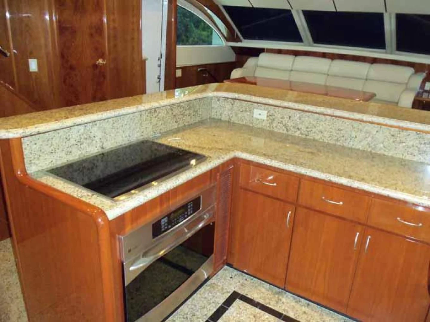 a kitchen with a sink and cabinets aboard DOLCE VITA Yacht for Sale