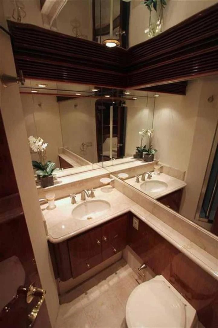 a bathroom with a sink and a toilet aboard DOLCE VITA Yacht for Sale