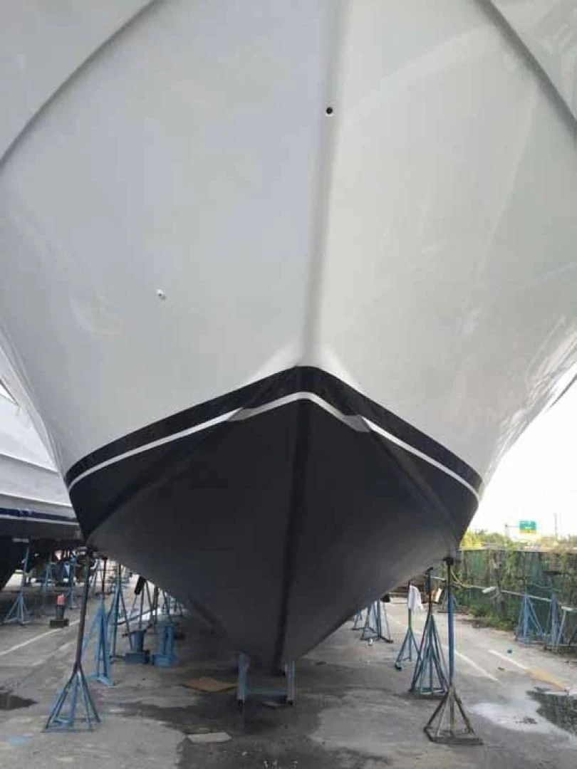 a black umbrella on a metal stand aboard DOLCE VITA Yacht for Sale