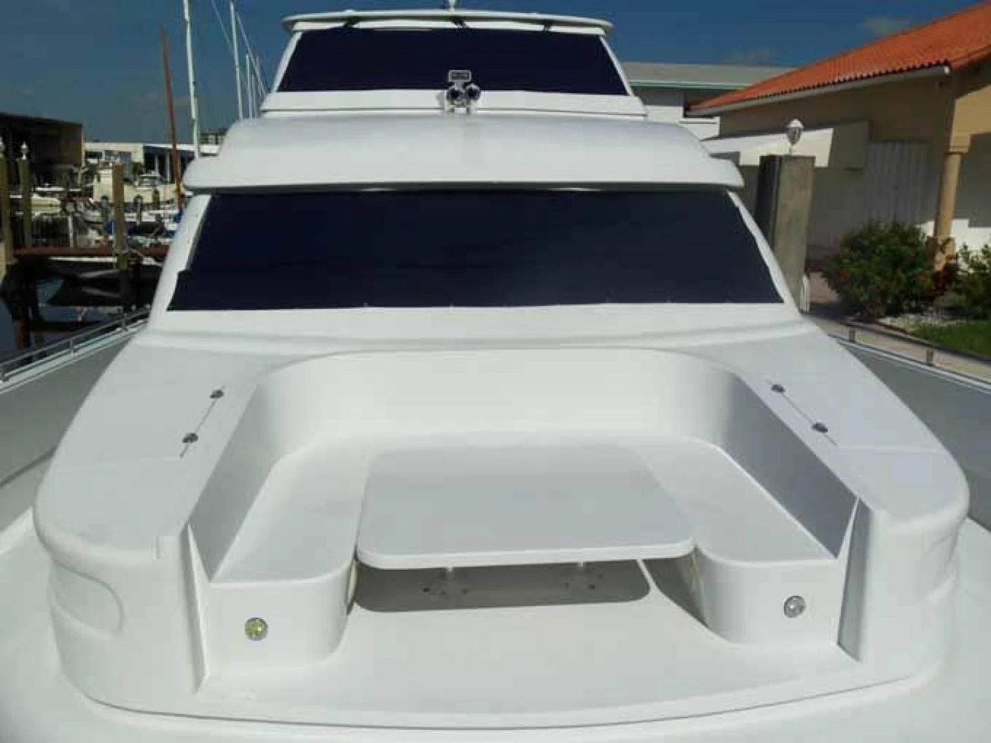 a white boat in a driveway aboard DOLCE VITA Yacht for Sale