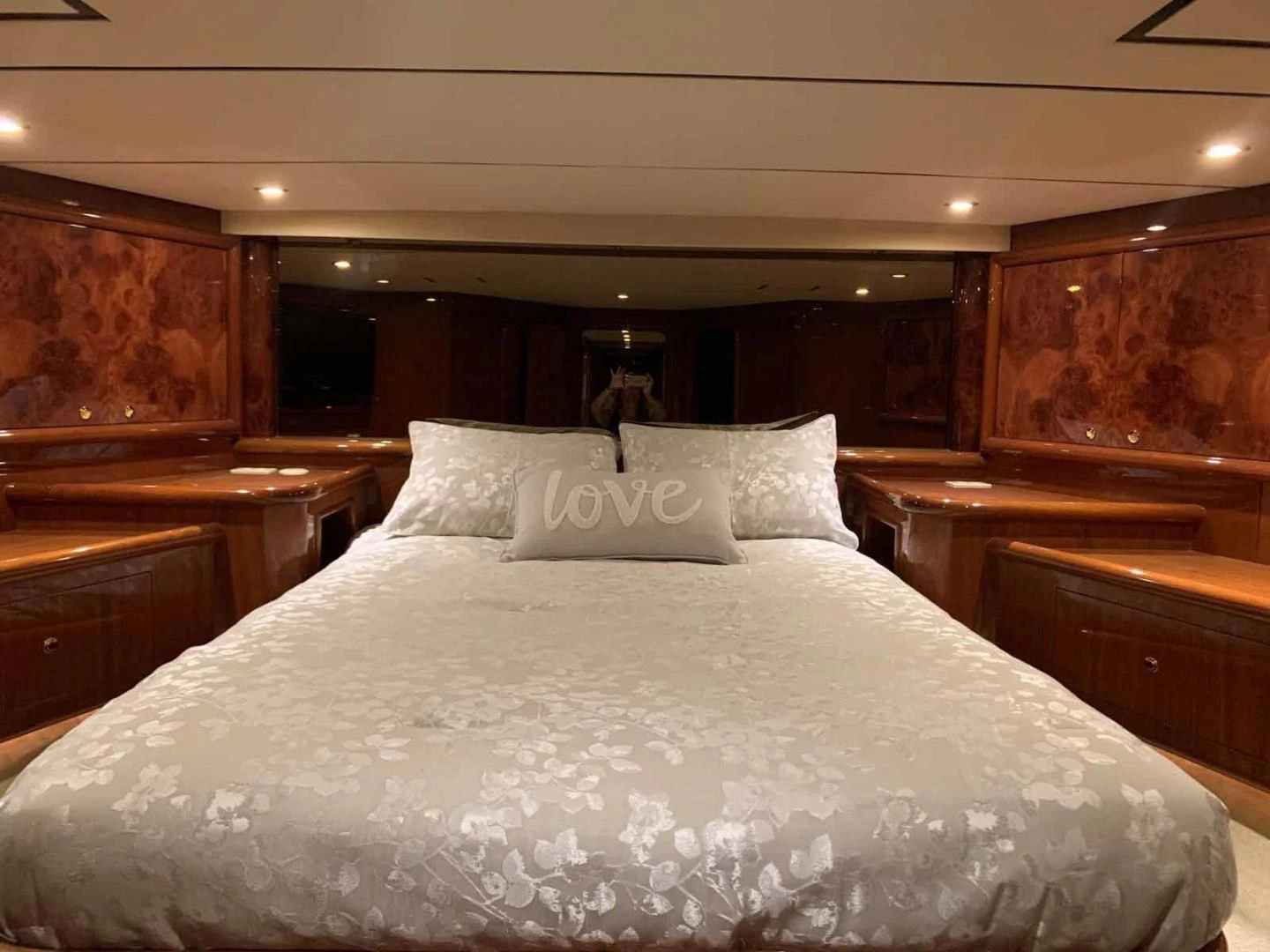 a bed with white sheets aboard DOLCE VITA Yacht for Sale