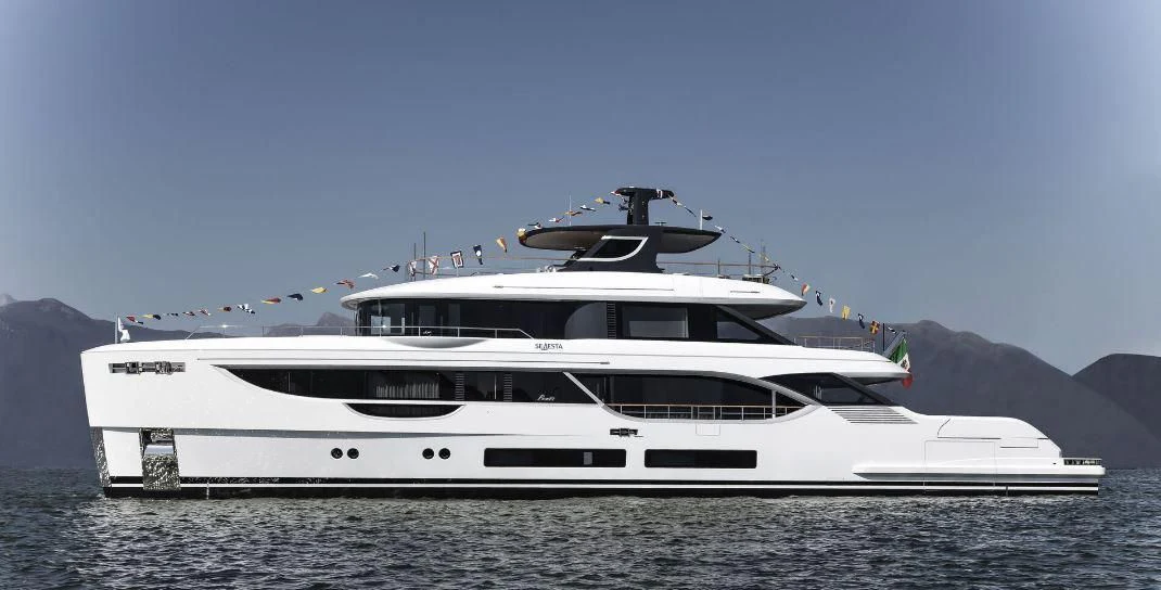 a white yacht on the water aboard SEAESTA Yacht for Sale