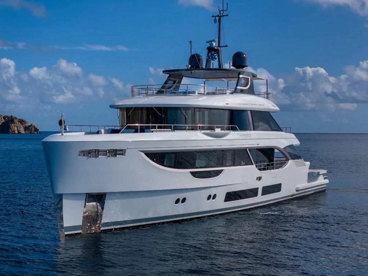 a white boat in the water aboard SEAESTA Yacht for Sale