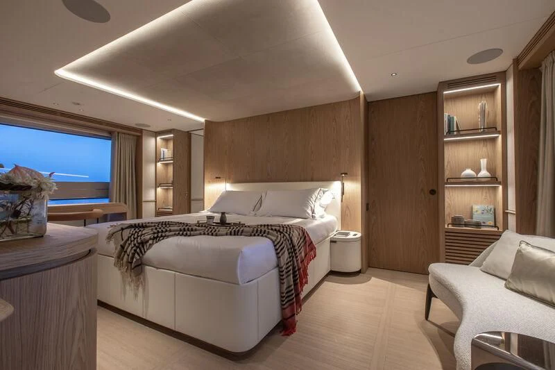 a room with a bed and a tv aboard SEAESTA Yacht for Sale
