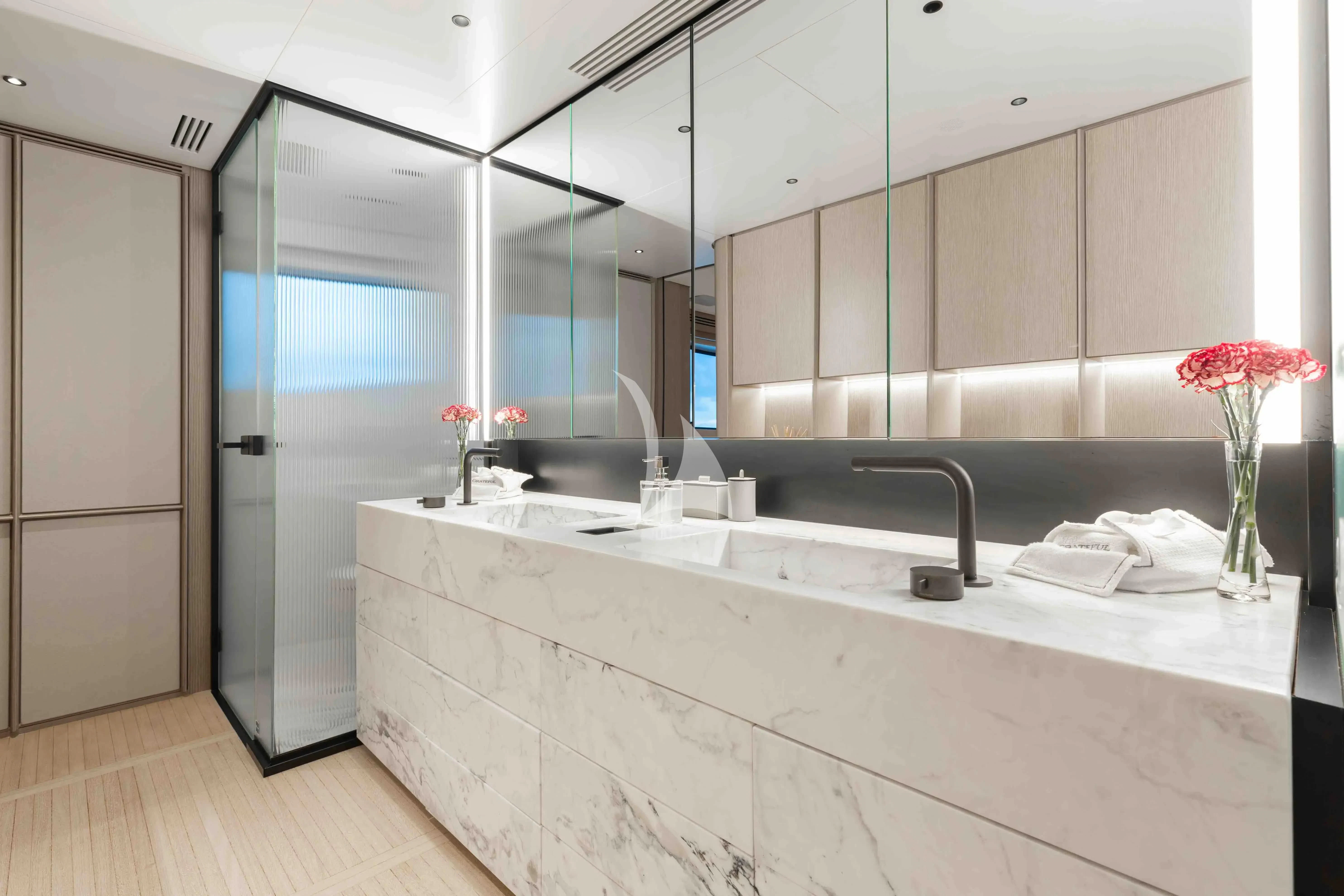 a modern bathroom with a large countertop aboard SEAESTA Yacht for Sale