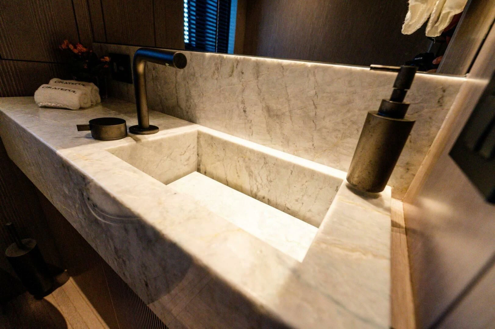 a large bathroom with a large tub aboard SEAESTA Yacht for Sale