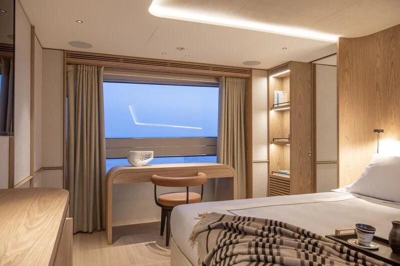 a room with a bed and a tv aboard SEAESTA Yacht for Sale
