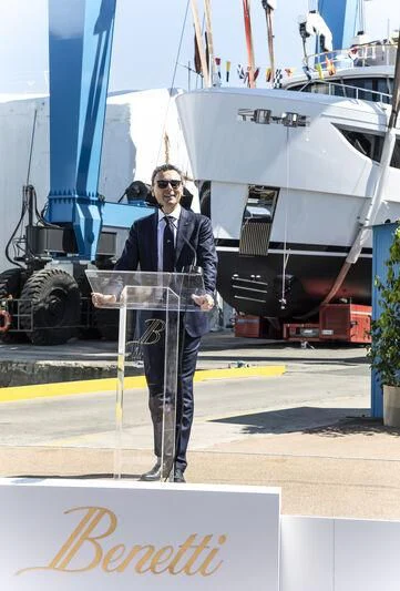 a person standing in front of a white boat aboard SEAESTA Yacht for Sale