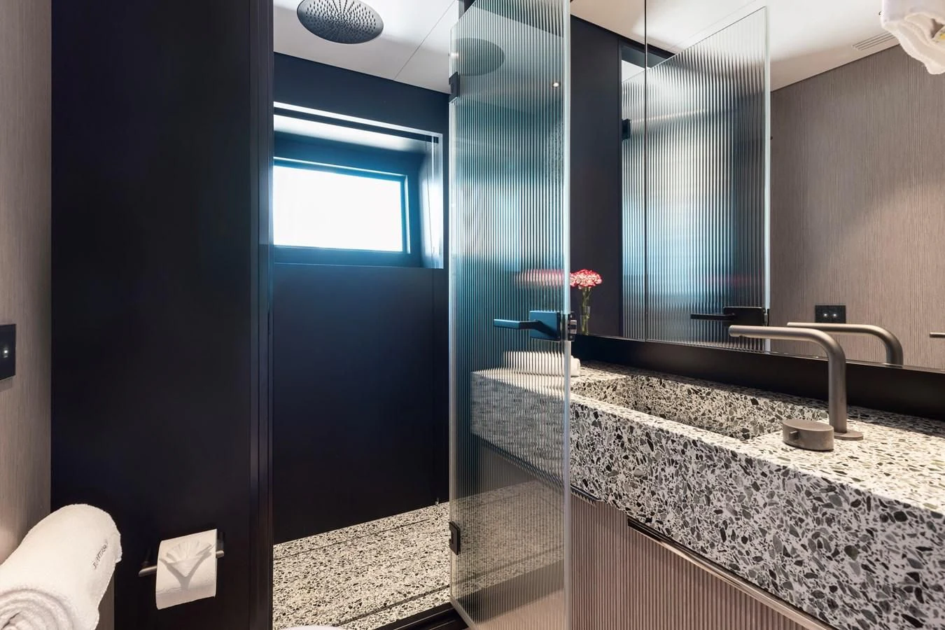 a bathroom with a marble counter top aboard SEAESTA Yacht for Sale