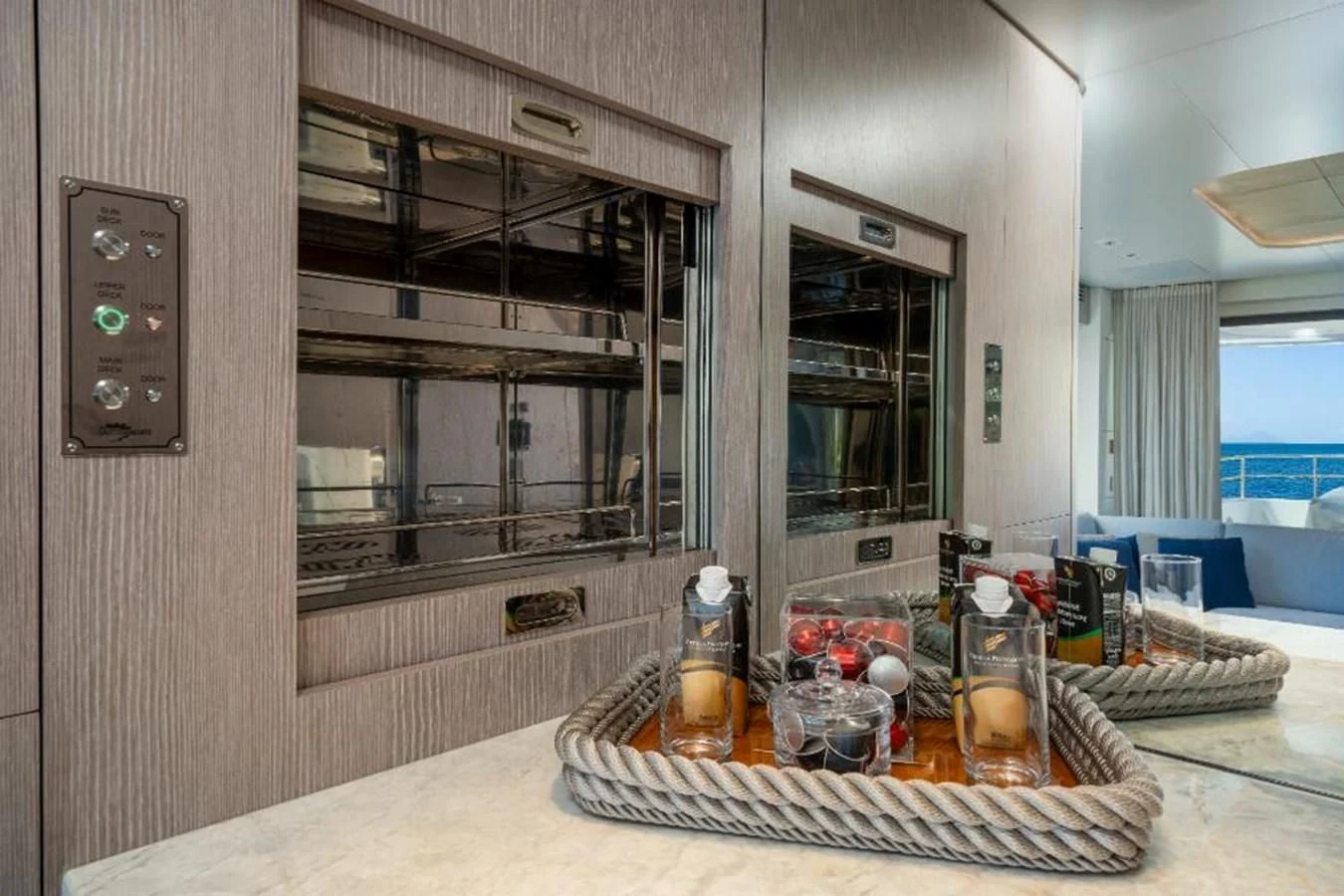 a kitchen with a countertop sink and a microwave oven aboard SEAESTA Yacht for Sale