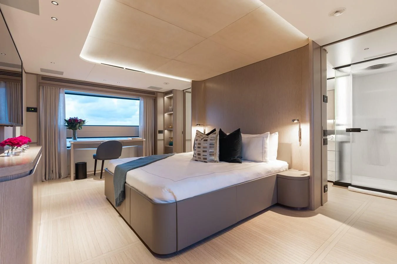 a bedroom with a large bed aboard SEAESTA Yacht for Sale
