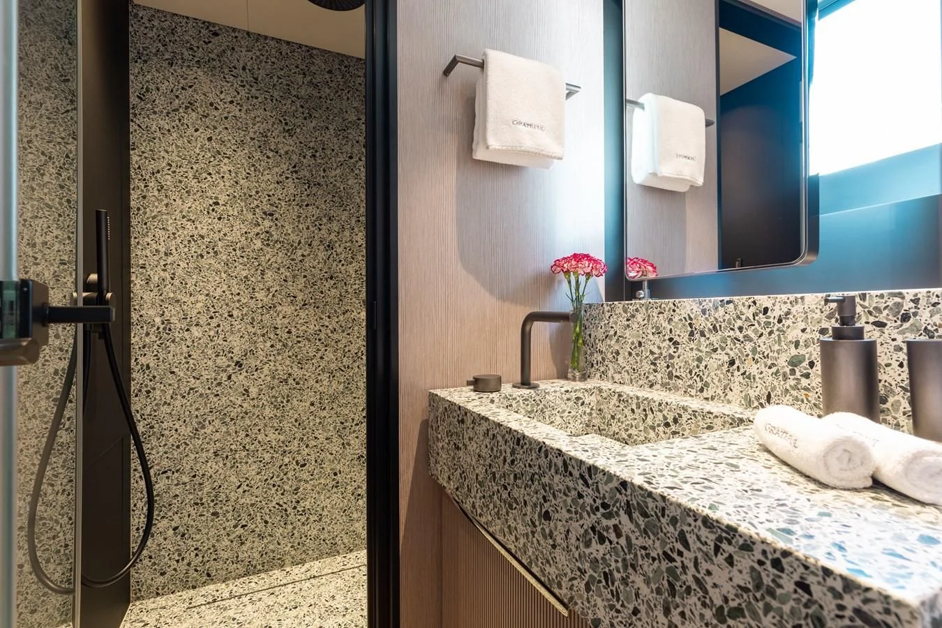 a bathroom with a marble countertop aboard SEAESTA Yacht for Sale