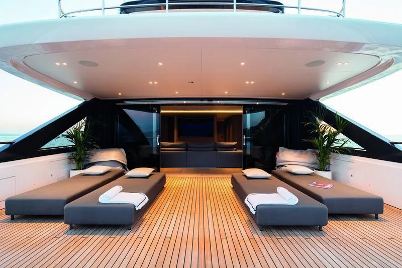 inside of a room with a large window and a wood floor aboard SEAESTA Yacht for Sale