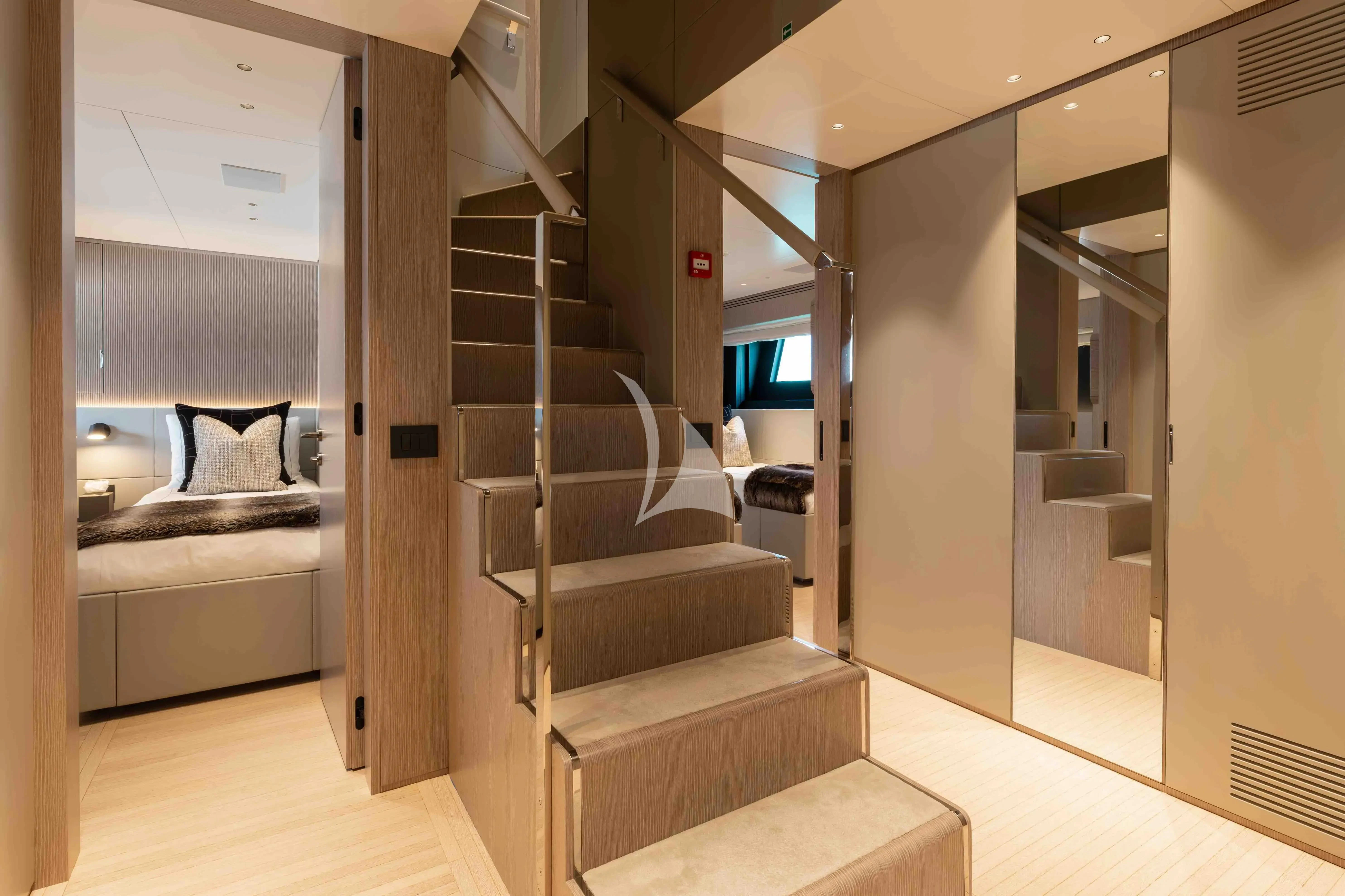 a room with a bed and a television aboard SEAESTA Yacht for Sale