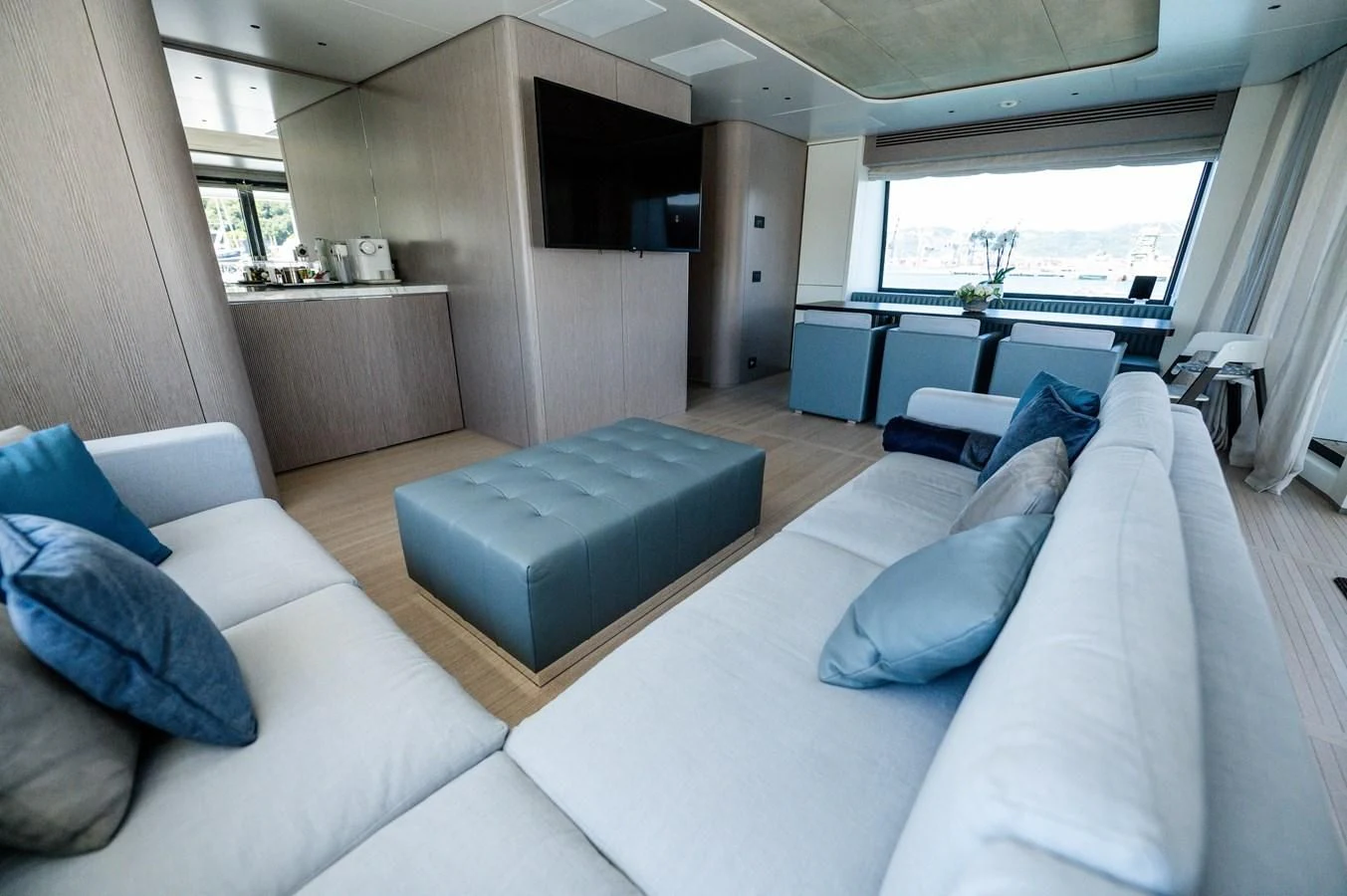 a room with a couch and a table aboard SEAESTA Yacht for Sale
