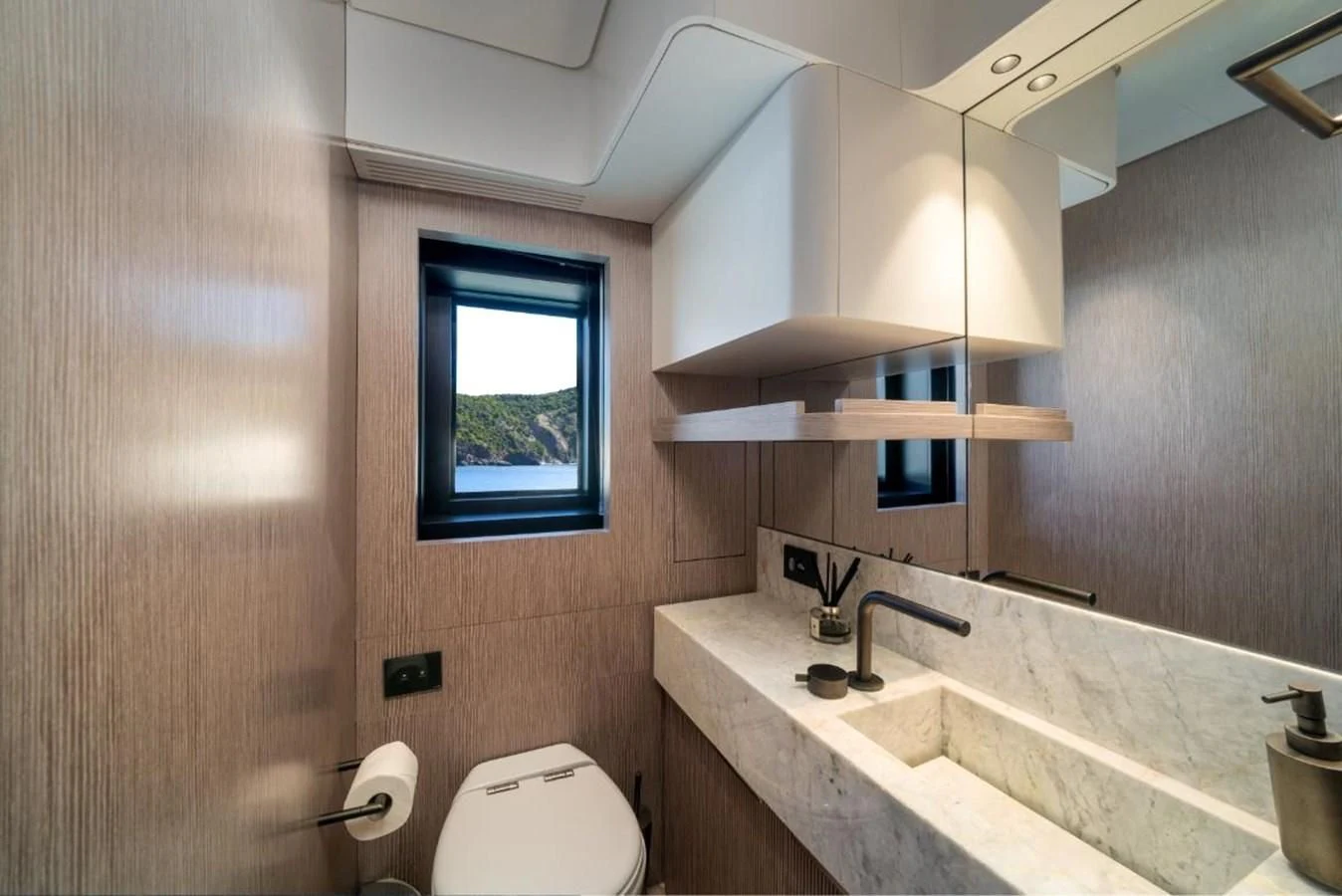 a bathroom with a sink and a toilet aboard SEAESTA Yacht for Sale