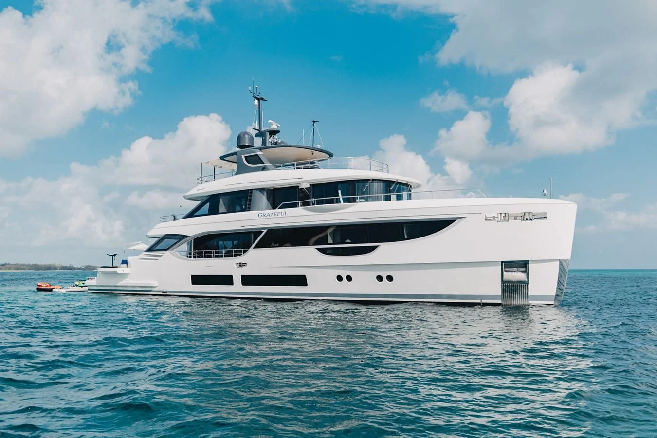 a white yacht in the water aboard SEAESTA Yacht for Sale
