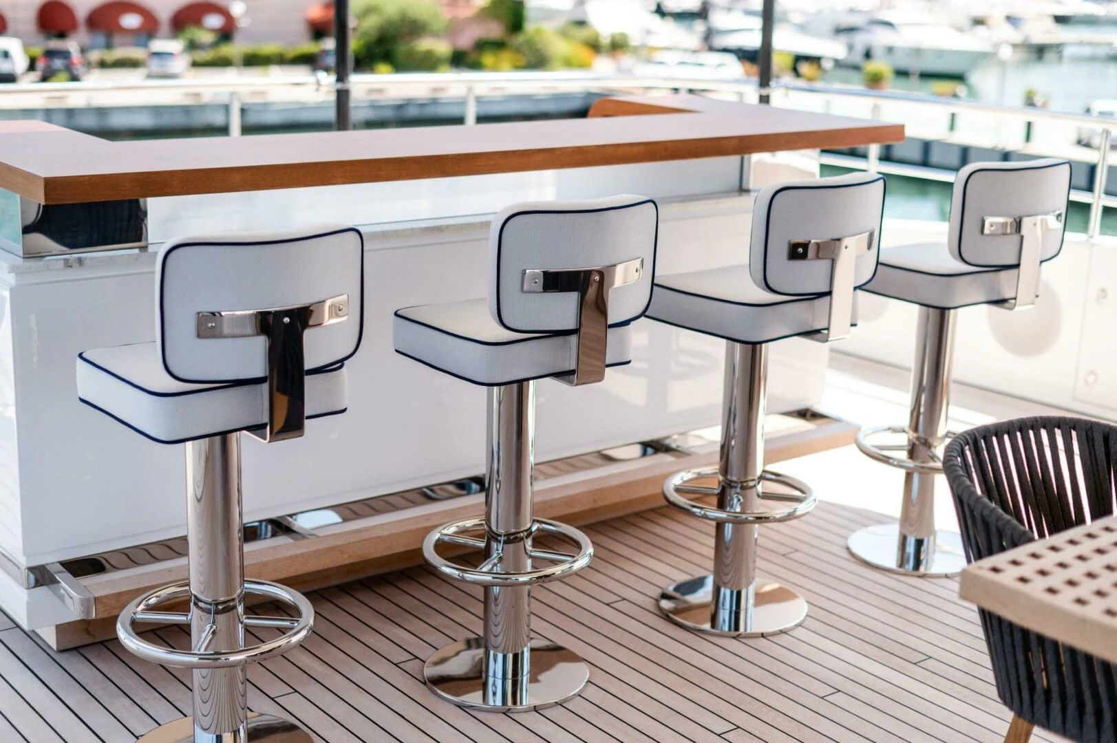 a table with chairs and a stool aboard SEAESTA Yacht for Sale