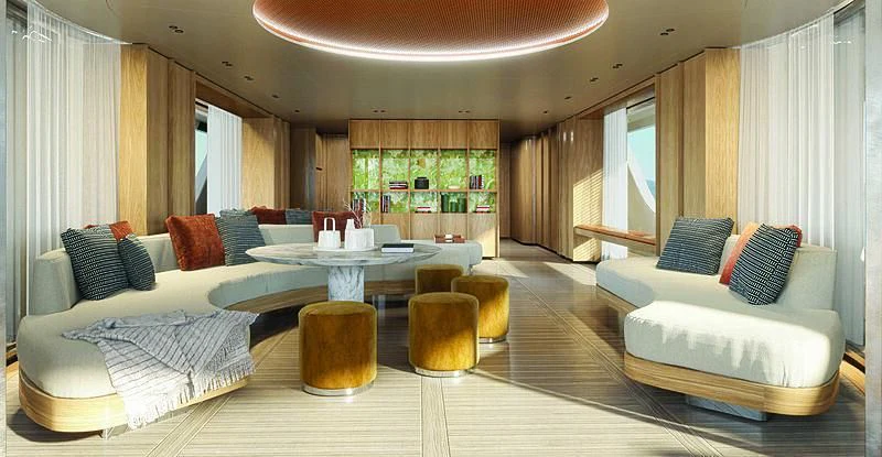 a large living room with a large table and chairs aboard SEAESTA Yacht for Sale