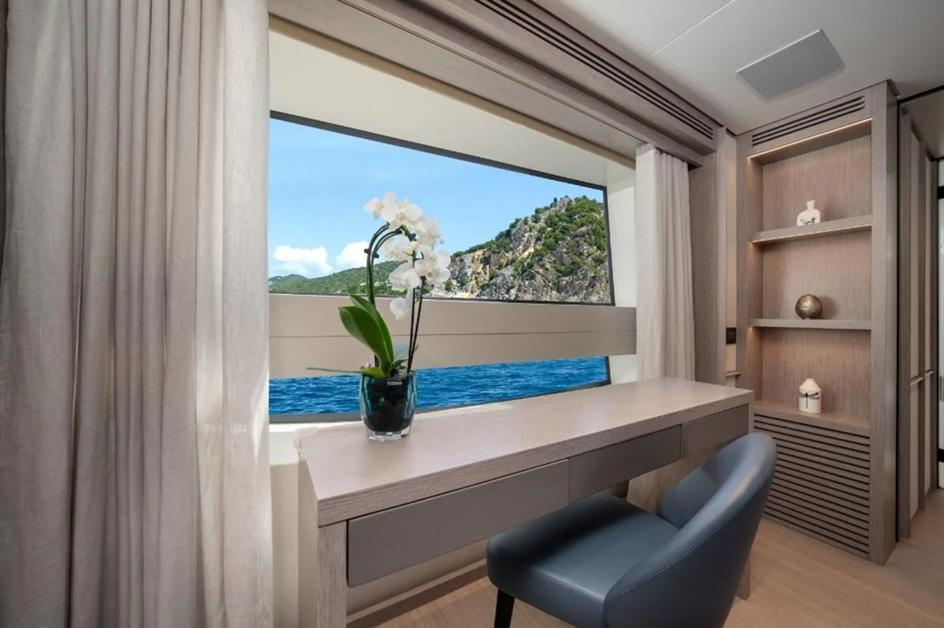 a room with a table and a window aboard SEAESTA Yacht for Sale
