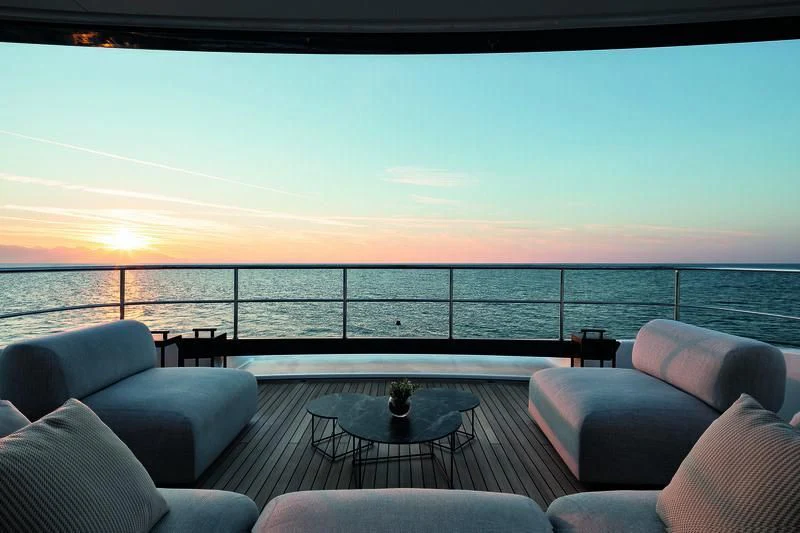 a large balcony overlooking a body of water aboard SEAESTA Yacht for Sale