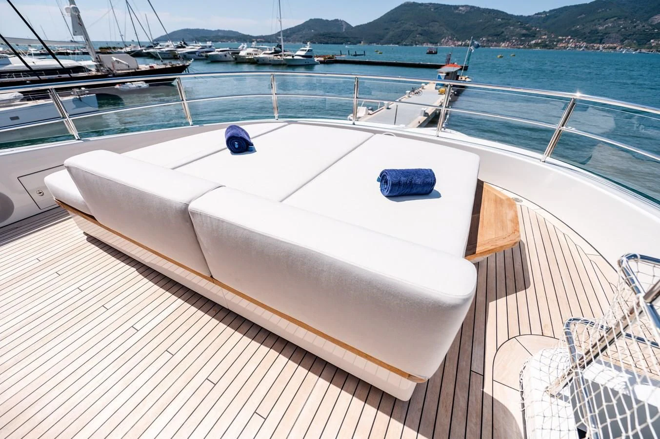 a white boat on a dock aboard SEAESTA Yacht for Sale