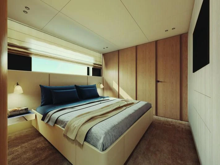 a room with a bed and a wood wall aboard SEAESTA Yacht for Sale