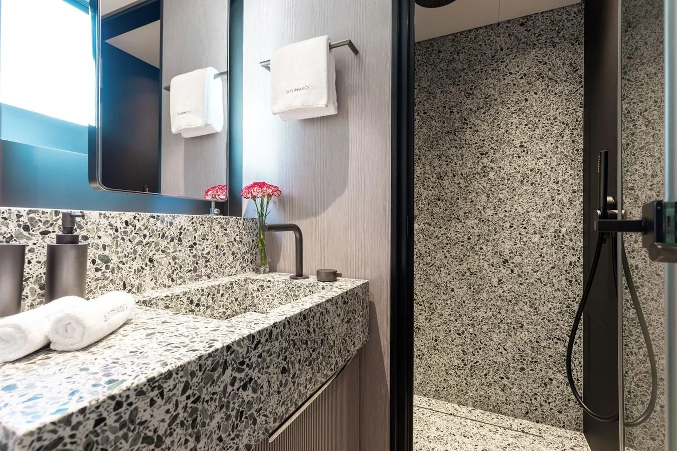 a bathroom with a sink and a mirror aboard SEAESTA Yacht for Sale